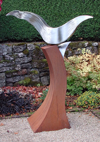 large outdoor commercial sculpture corten and stainless steel